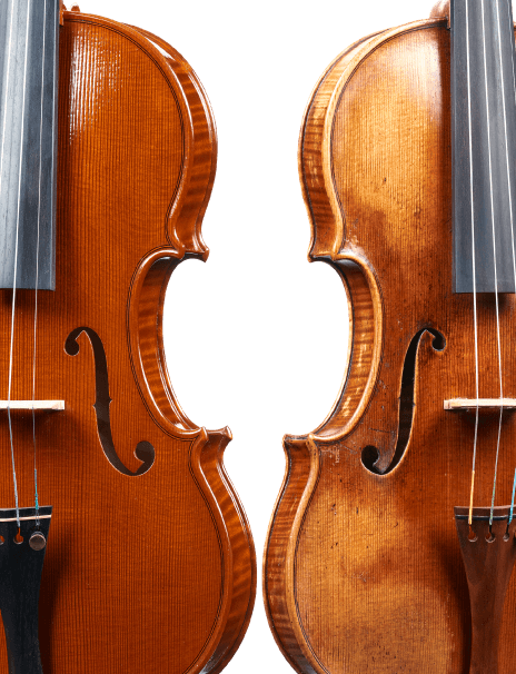 Two models of handcrafted violins detailed side by side