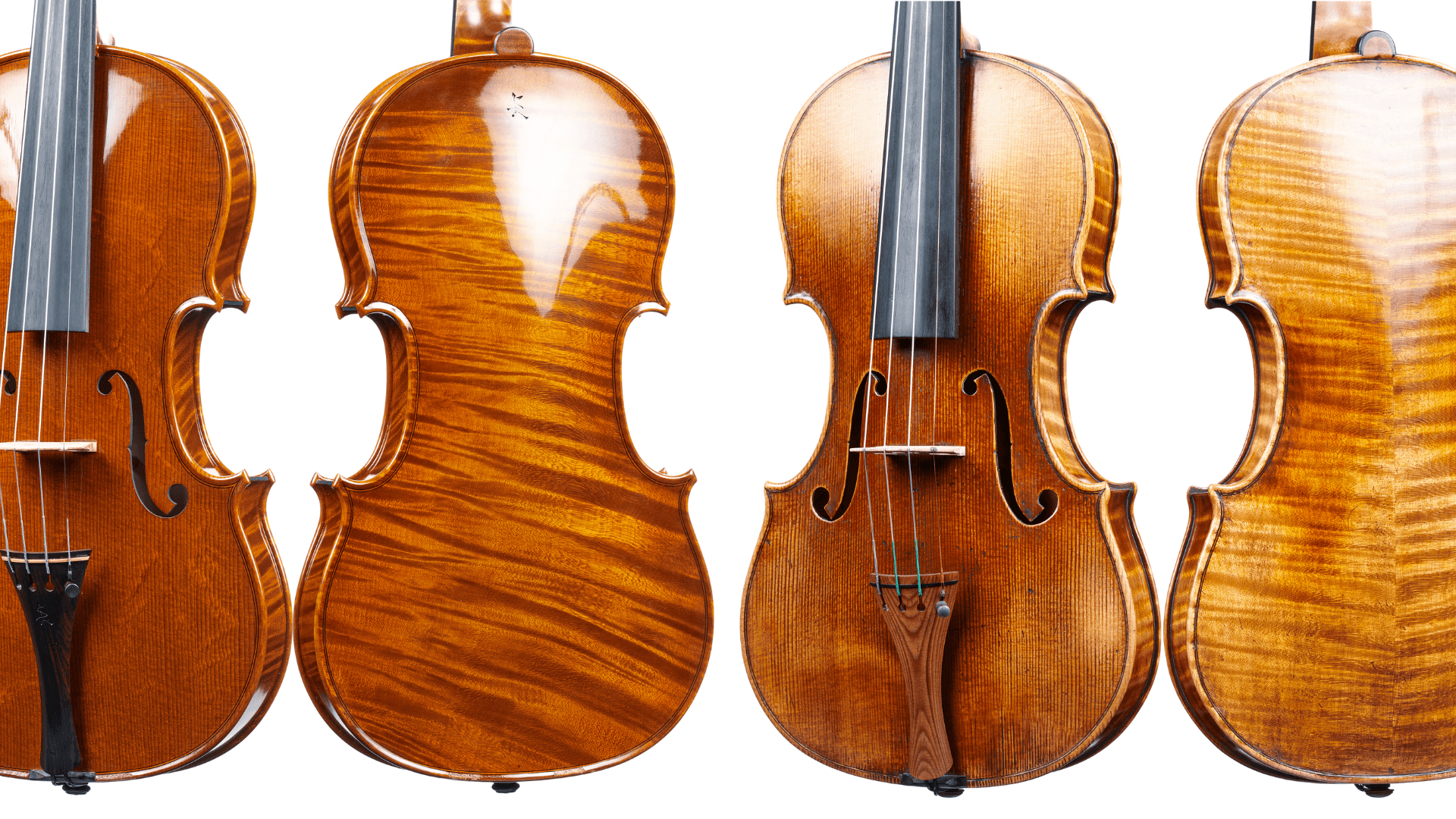 four different handcrafted violin models